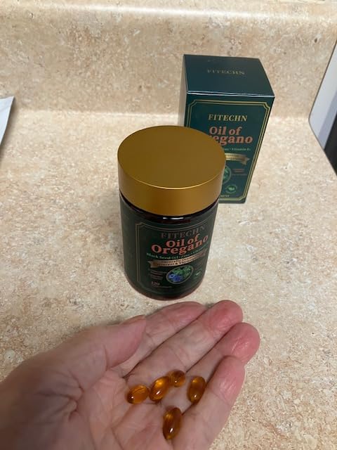 Customer photo of oregano oil softgels beside the bottle